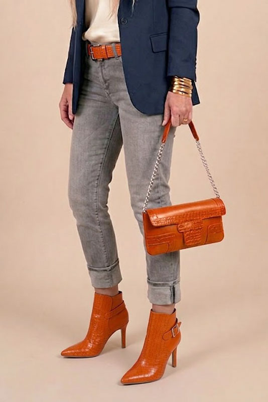 Dress clutch for wedding and parties in apricot orange leather - Worn view